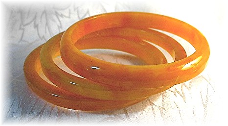 Lucite Plastic 3 Gold Yellow Bangle Bracelets