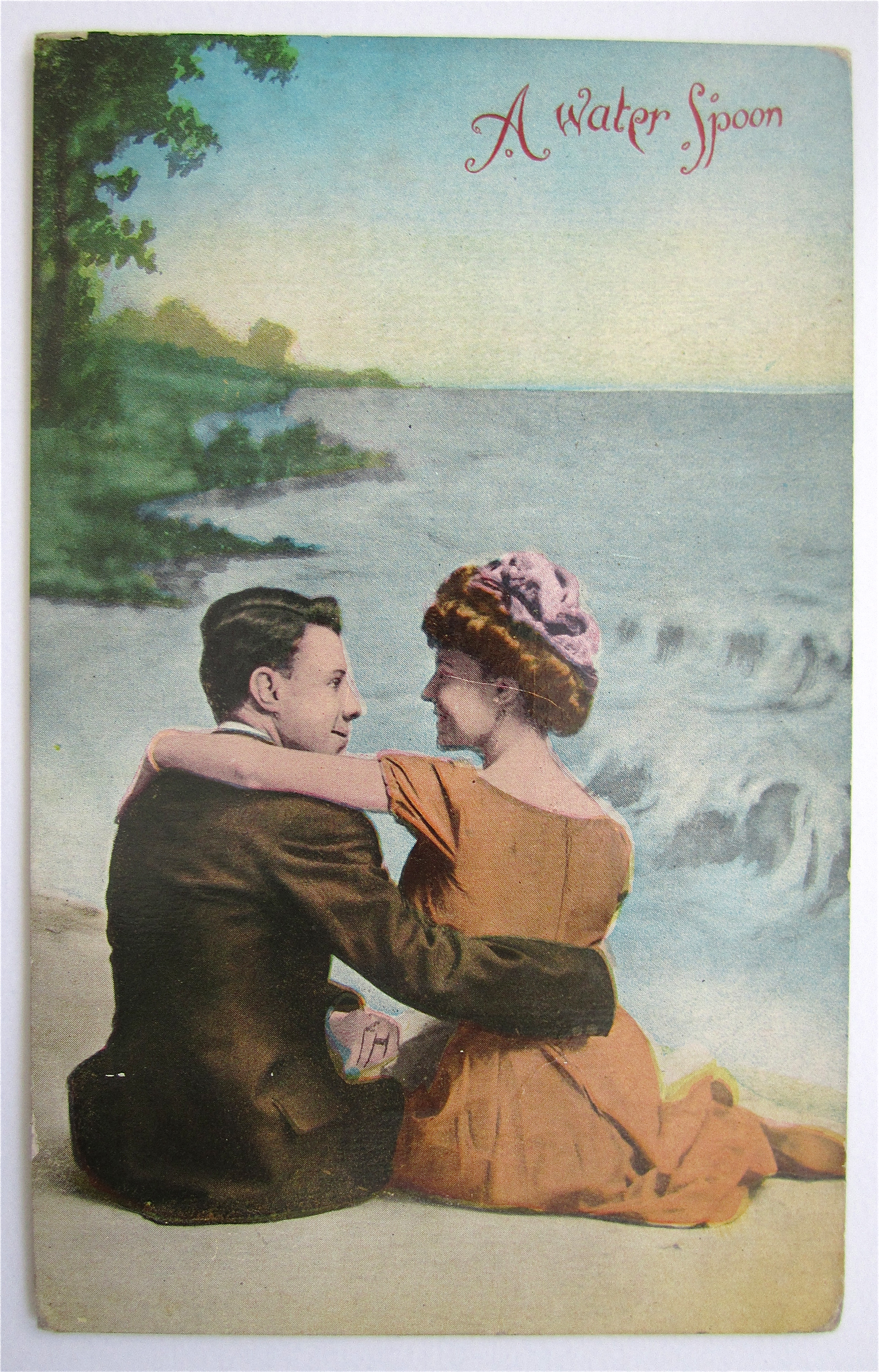 Man And Woman Sitting On Beach Postcard