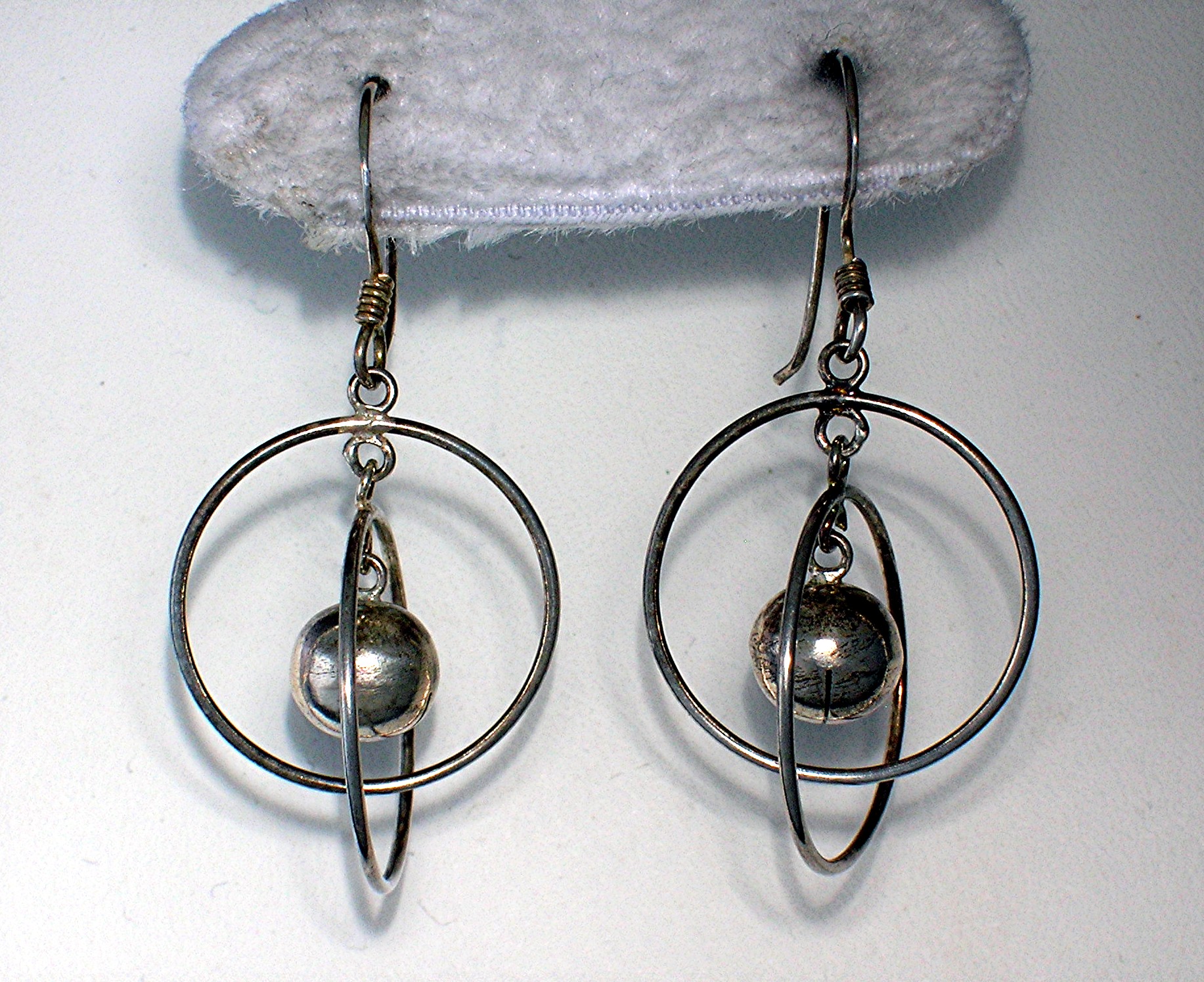 Sterling Silver Hoop and Ball Earrings.