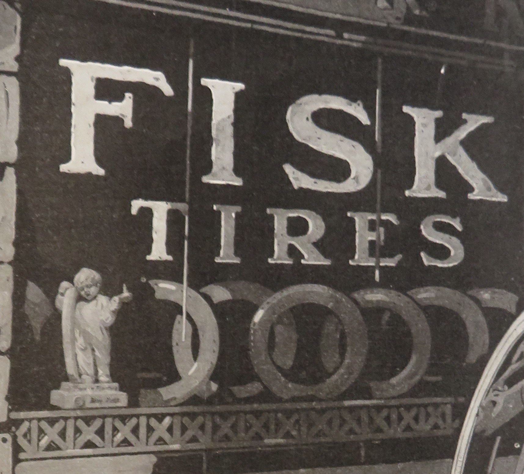 1916 Fisk Tires with Man Carrying a Tire