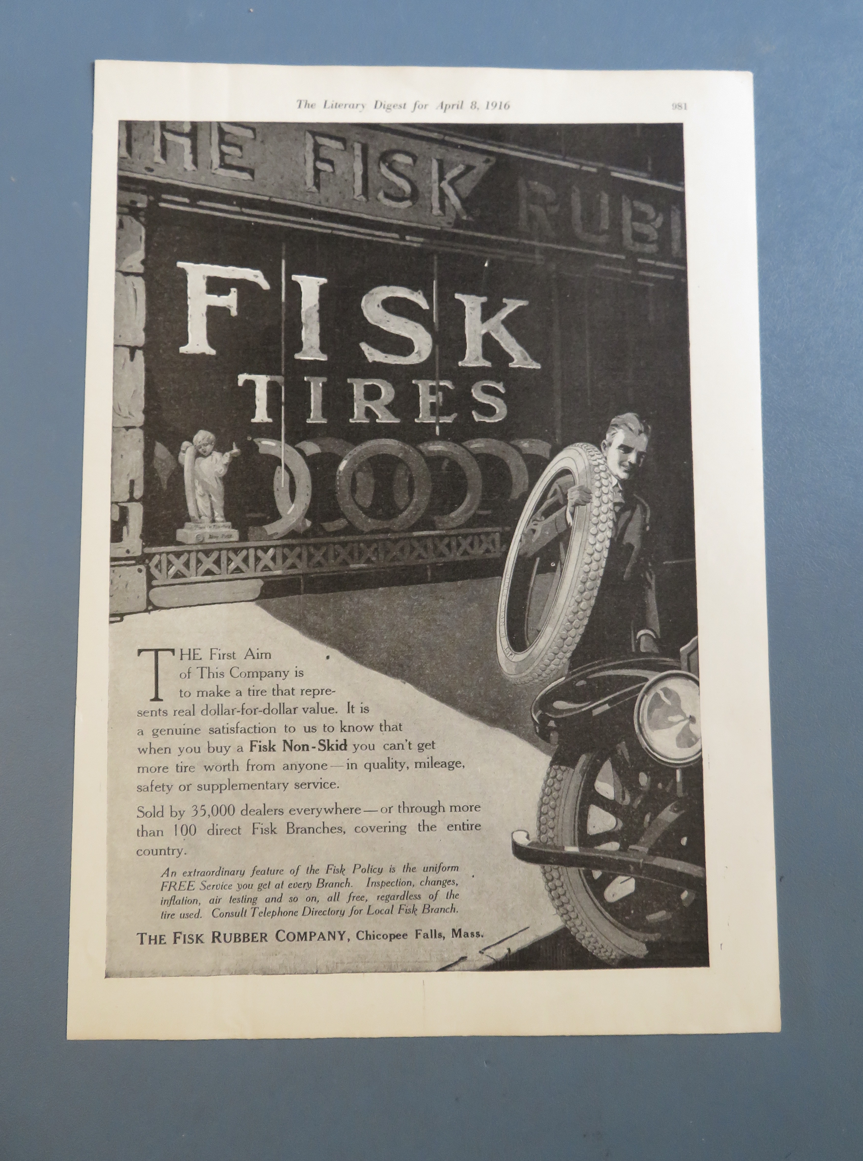 1916 Fisk Tires with Man Carrying a Tire