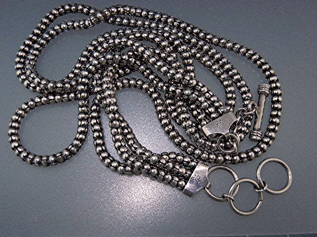 Silver Bead Necklaces Office Cupboard White Tag