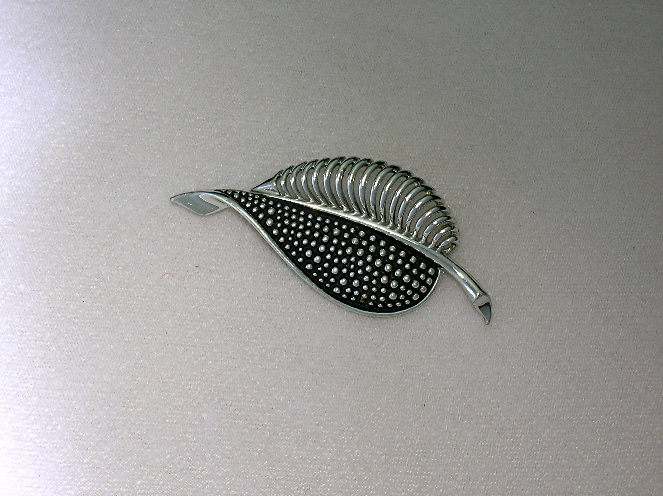 Silver MX 209 Rhodium Leaf Brooch