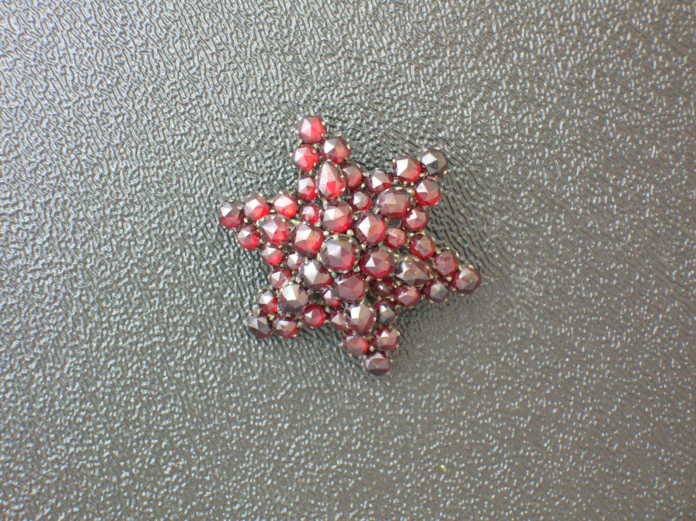 Victorian Silver Gilt Garnet Starburst Brooch