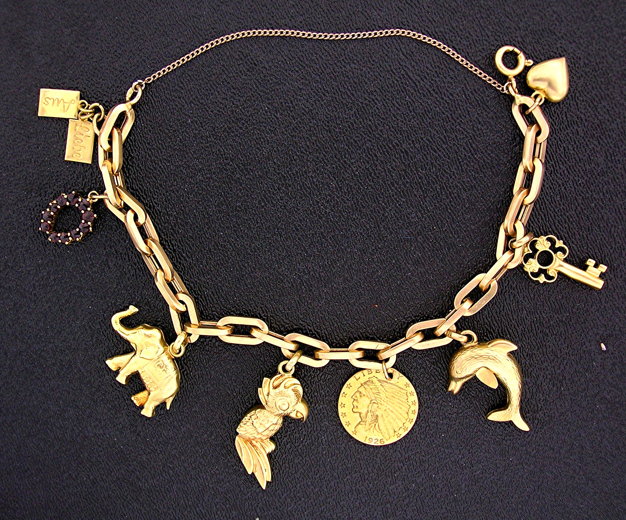 Bracelet  14K Gold 9 CHARM 22.1 grams