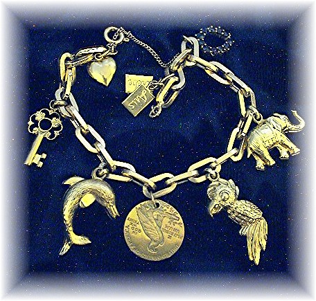 Bracelet  14K Gold 9 CHARM 22.1 grams
