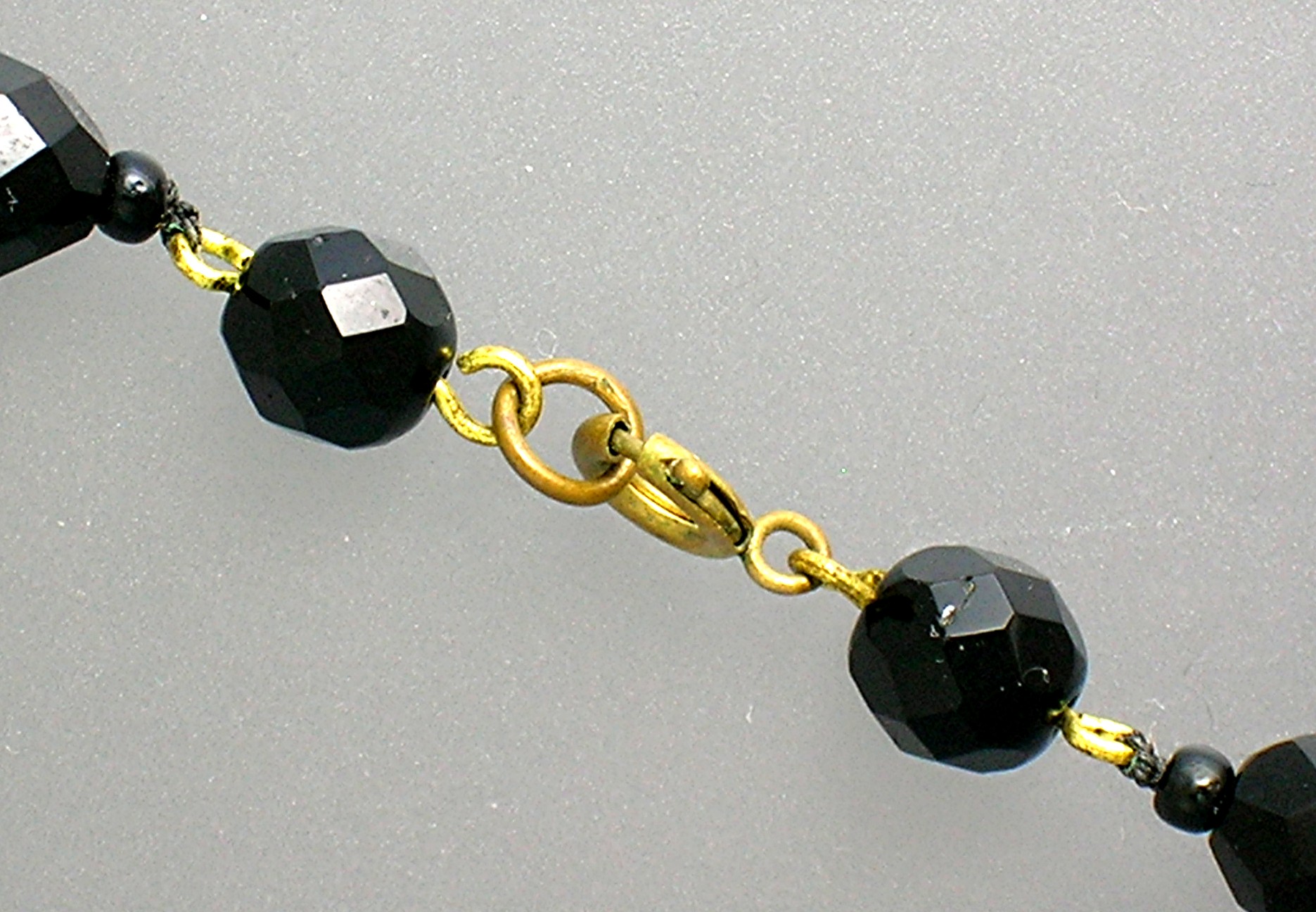 Black  Glass 24 Inch Graduated Necklace