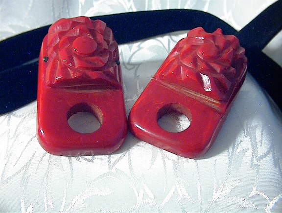 Red Carved Bakelite Flowers On Black Suede