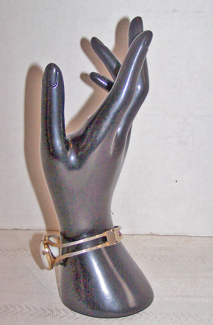 Clamper Bracelet, White Plastic Ovals, Gold Tone Metal