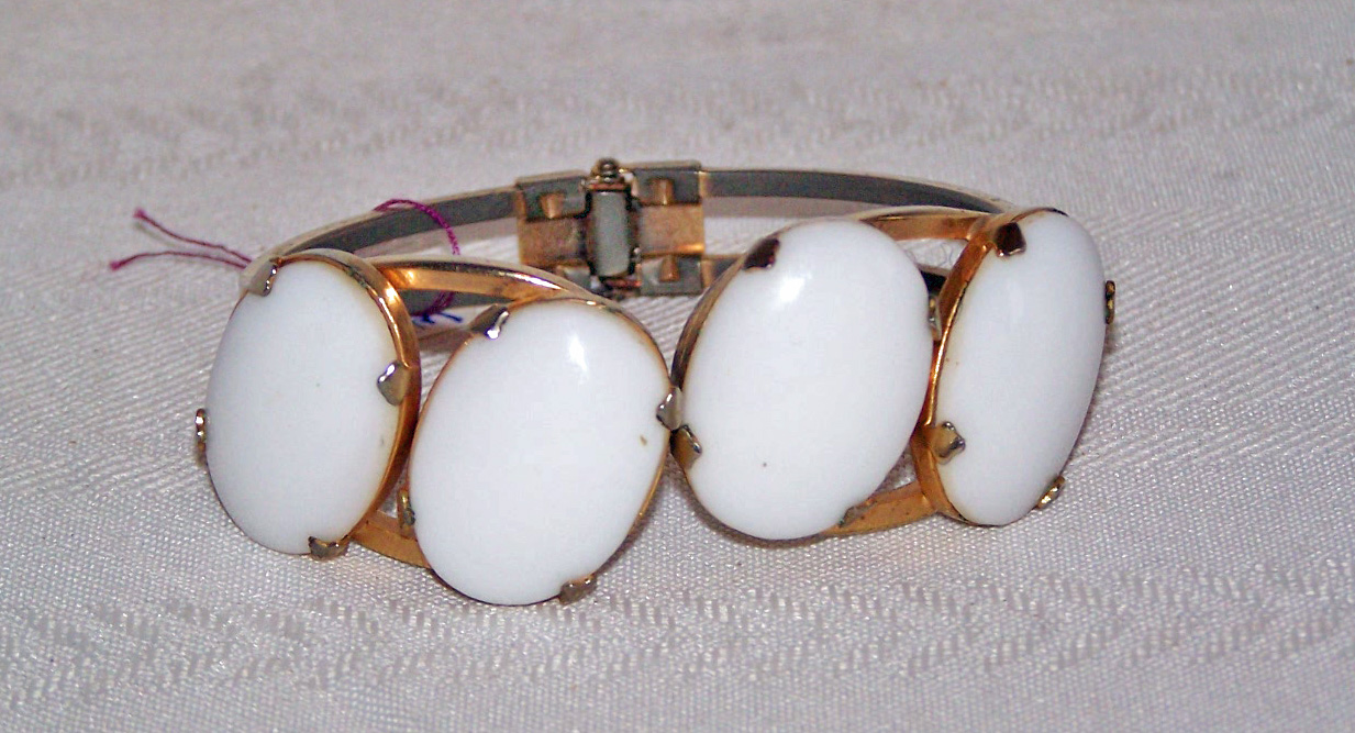 Clamper Bracelet, White Plastic Ovals, Gold Tone Metal