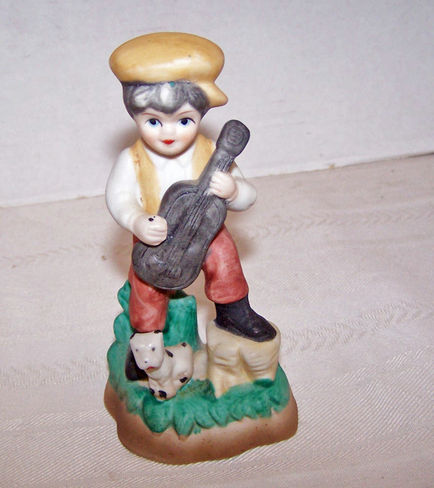 Bisque Boy Figurine with his Dog, as the Boy Plays