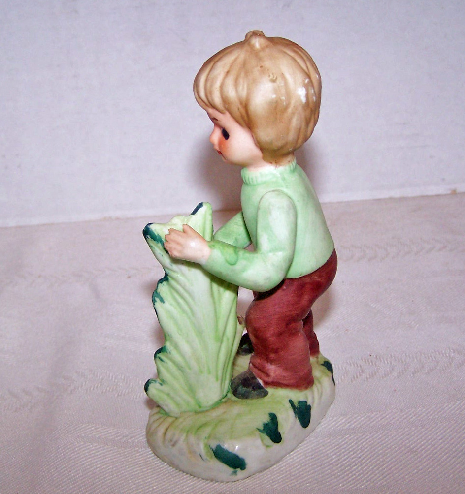 Bisque Boy Figurine Holding Scissors Tending to Plant