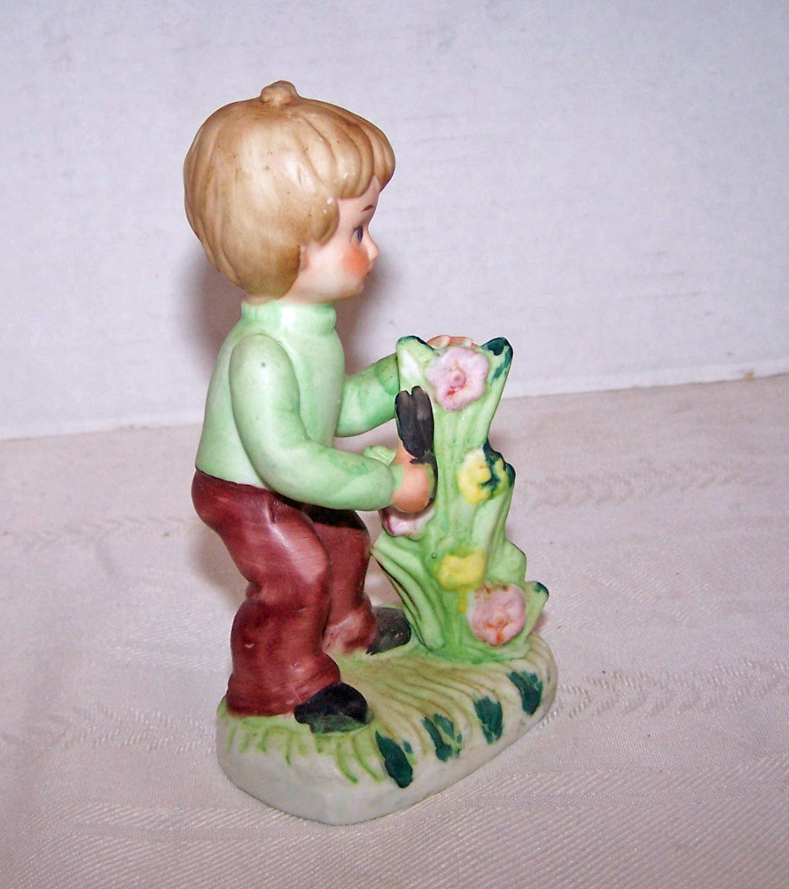 Bisque Boy Figurine Holding Scissors Tending to Plant