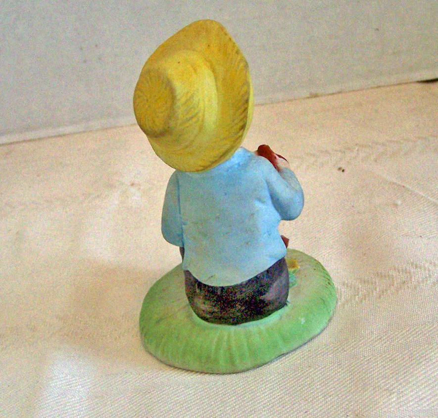 Bisque Boy Figurine Sitting & Playing the Accordion