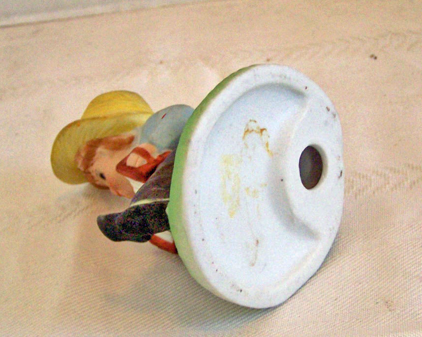 Bisque Boy Figurine Sitting & Playing the Accordion