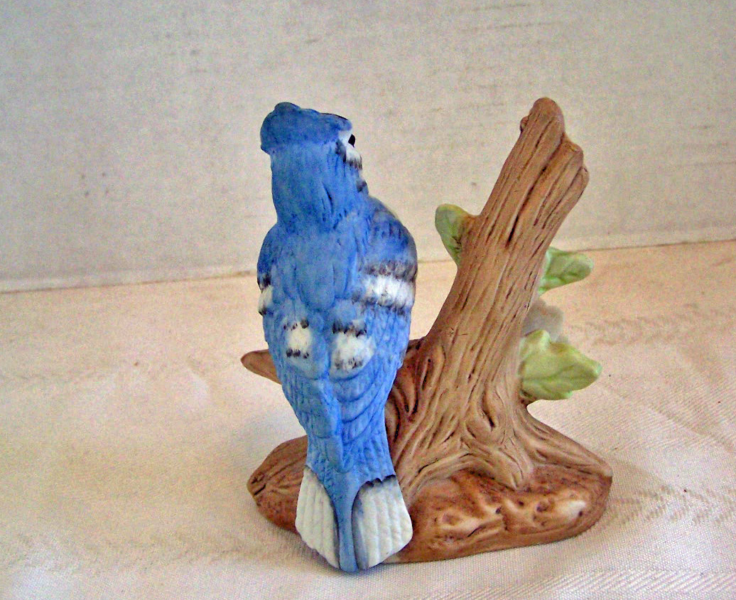 Bisque Bird Sitting on Branch with Flowers Figurine