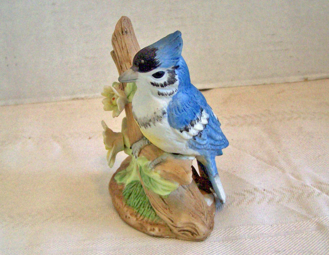 Bisque Bird Sitting on Branch with Flowers Figurine