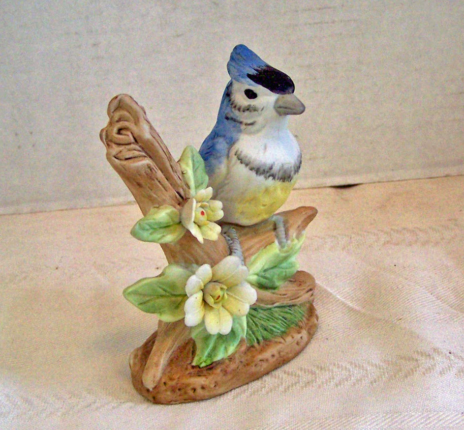 Bisque Bird Sitting on Branch with Flowers Figurine