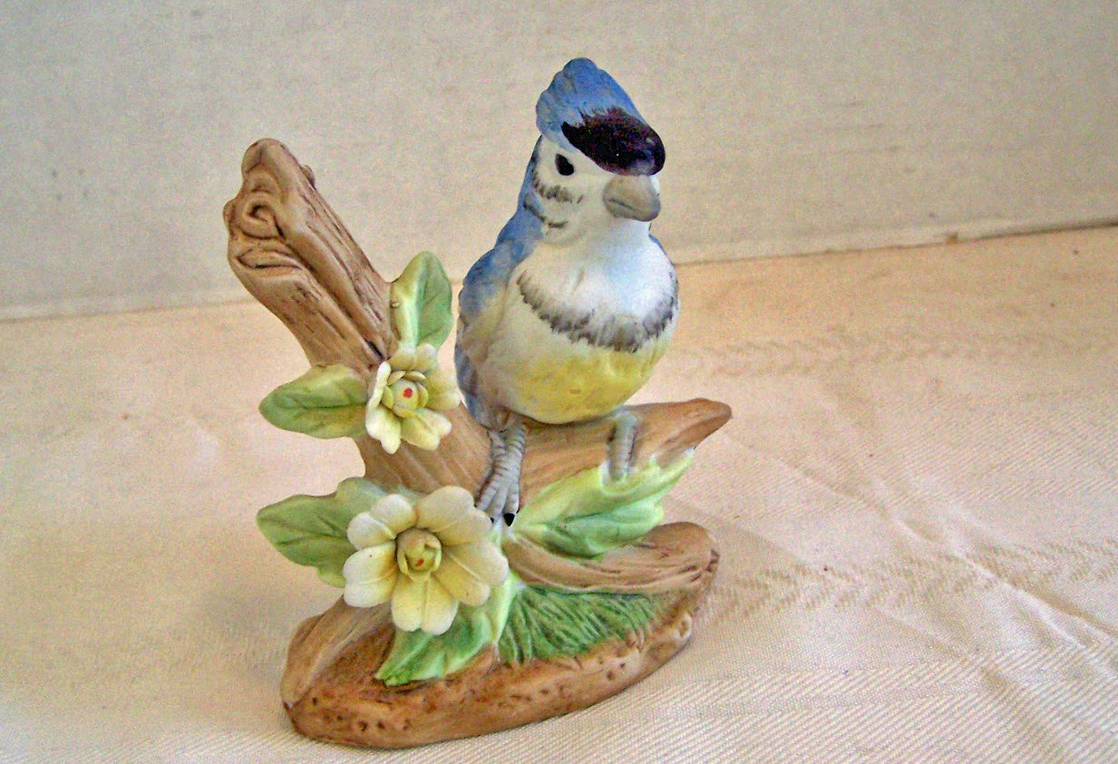 Bisque Bird Sitting on Branch with Flowers Figurine