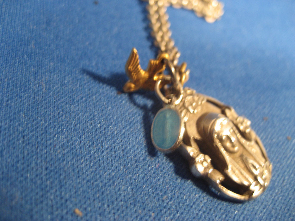 Metal of Mary with 2 charms