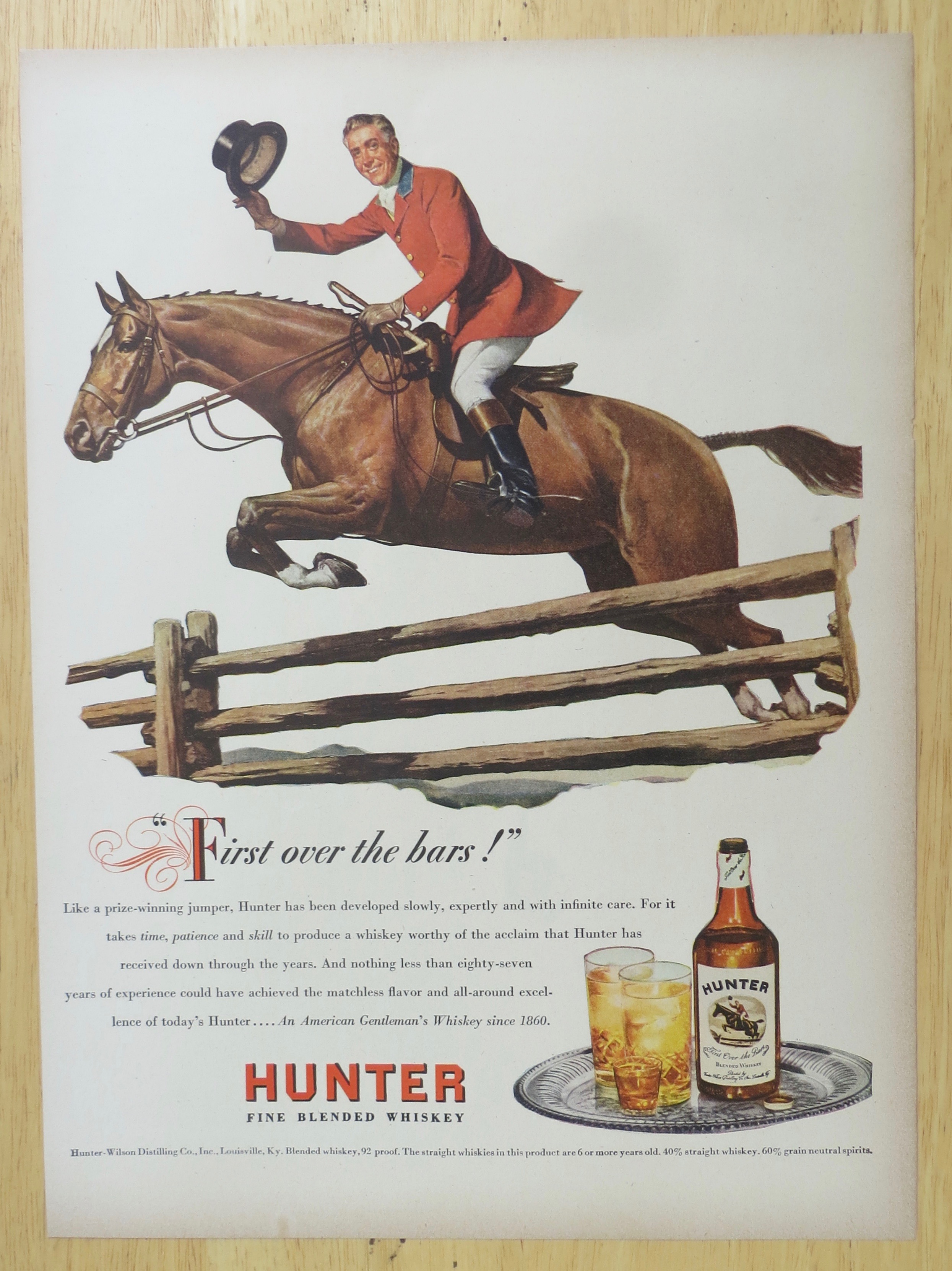 1947 Hunter Whiskey with Man Riding on a Horse