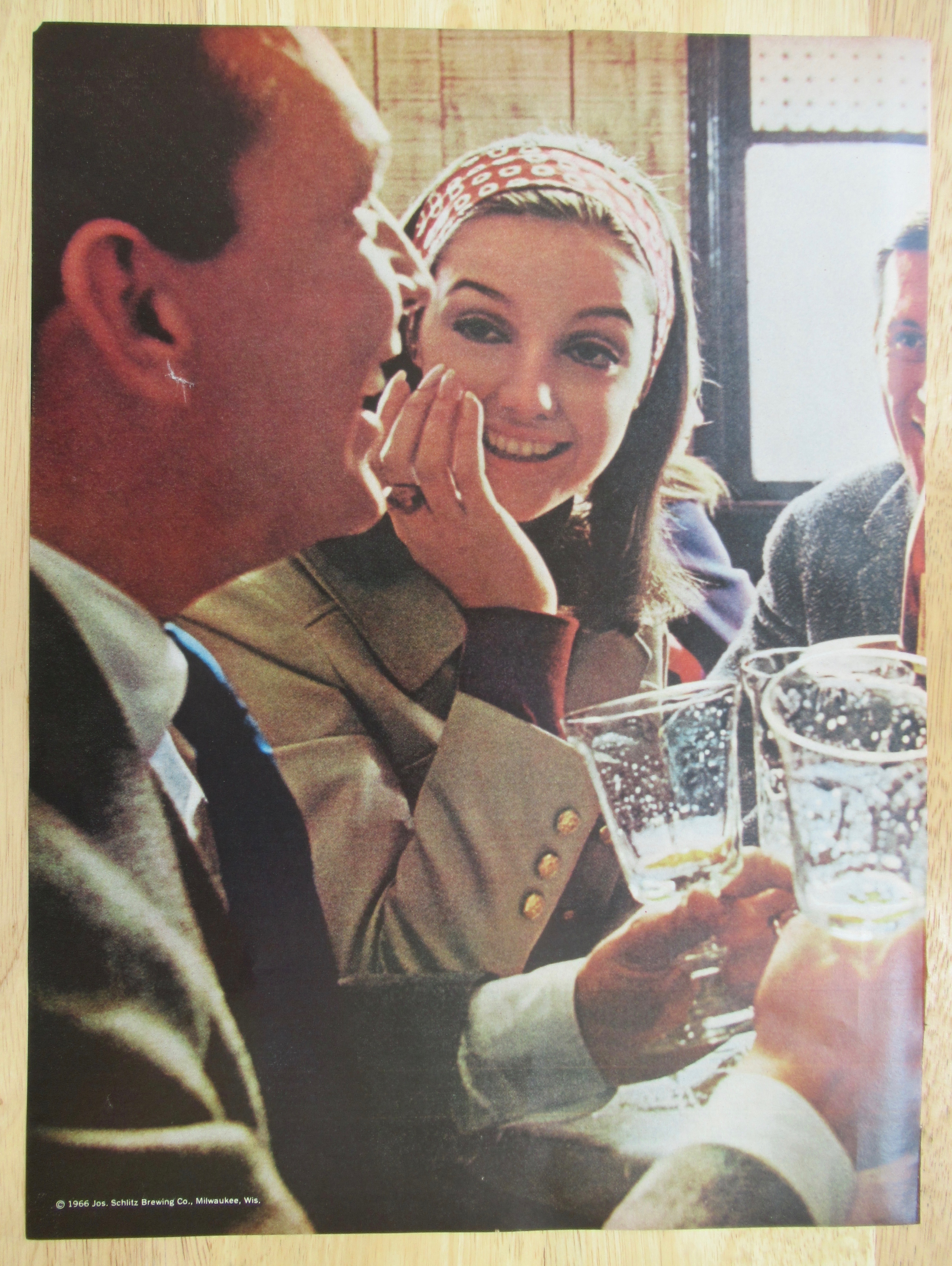 1966 Schlitz Beer with People Enjoying Some Beers