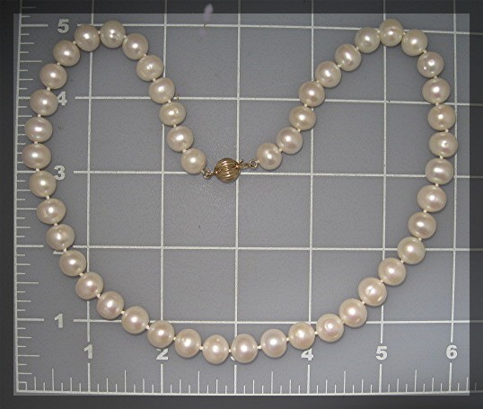 14 K Gold Clasp Cultured Pearls 11mm White
