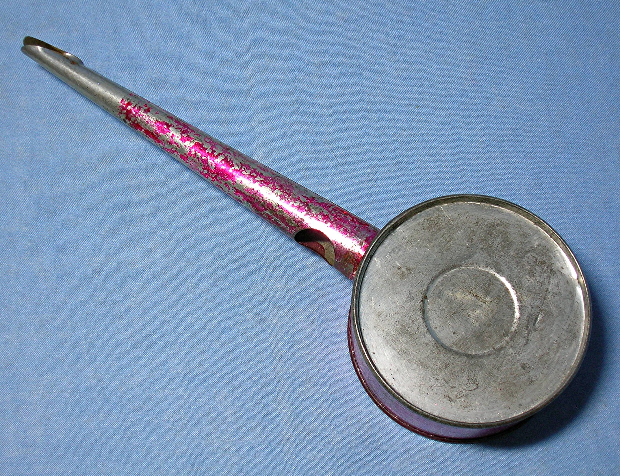 Vintage tin noise maker, whistle and rattle .  .  .