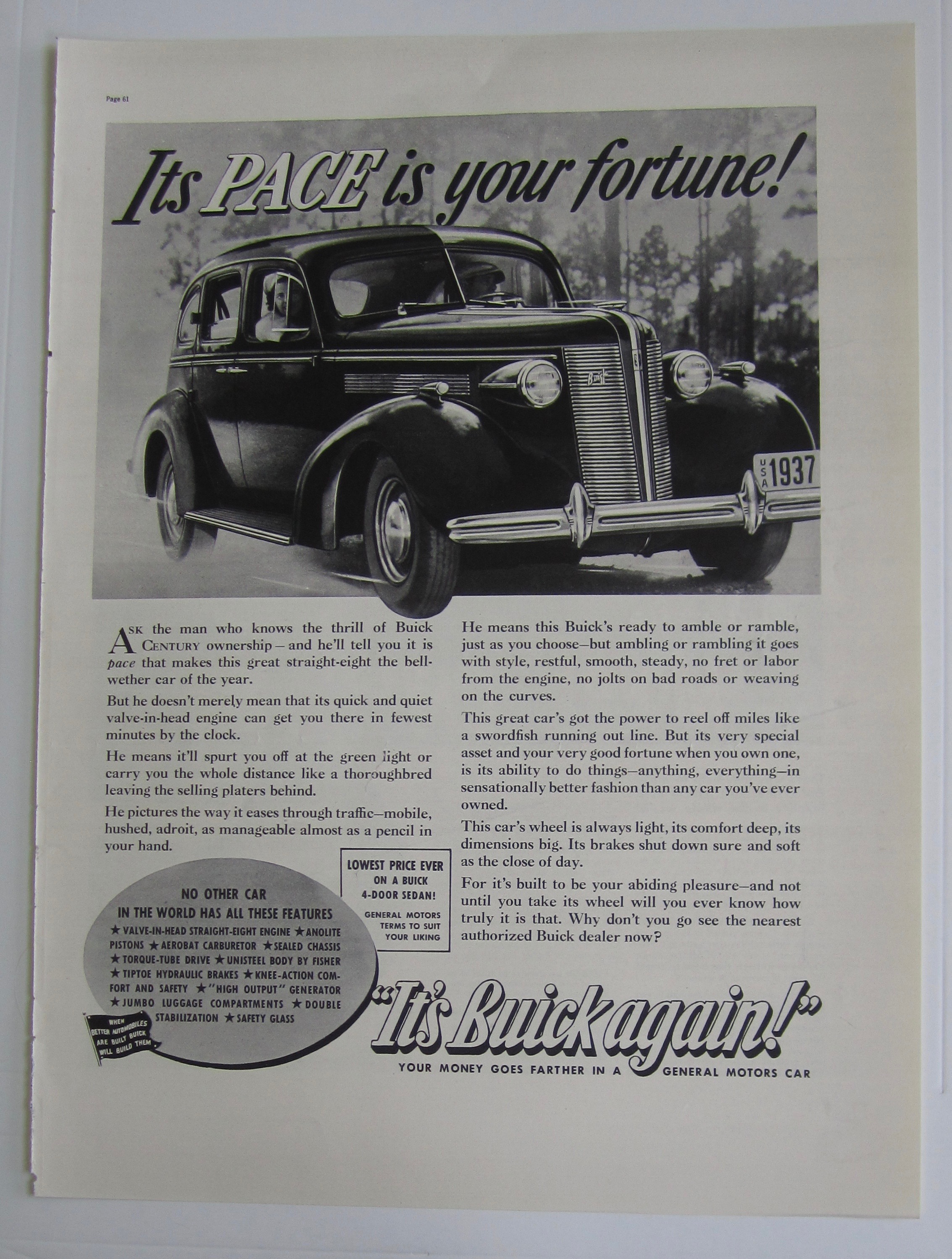 1937 Buick with a couple driving in Buick