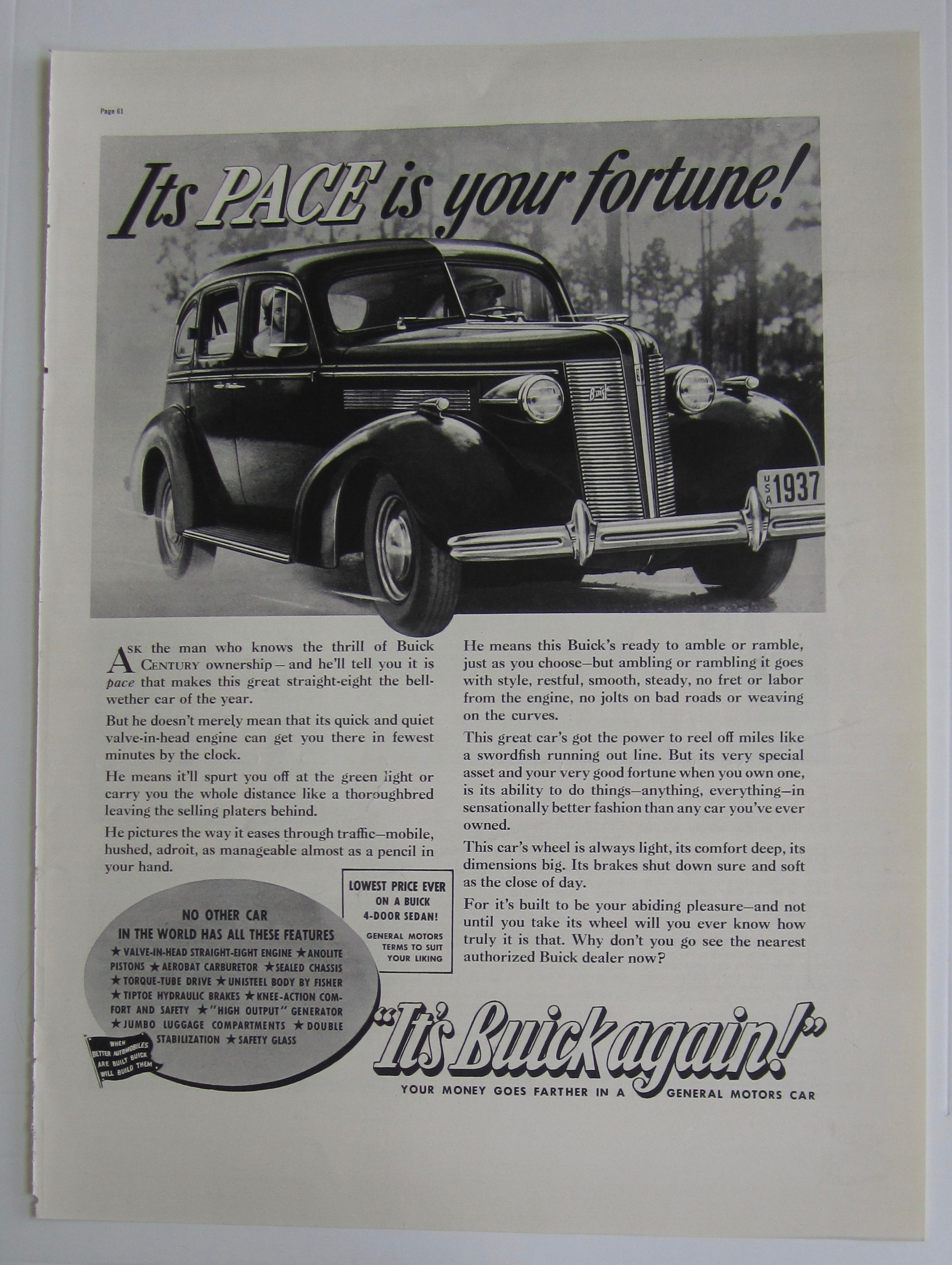 1937 Buick with a couple driving in Buick