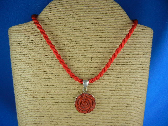 Charles Albert Carved Coral Sterling Silver Pendant