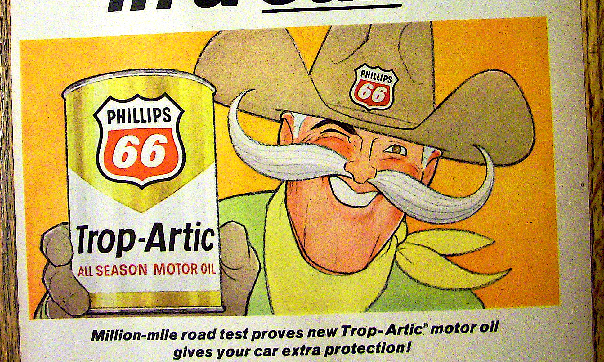 1966 Phillips 66 Trop Artic Motor Oil w/Man Holding Can