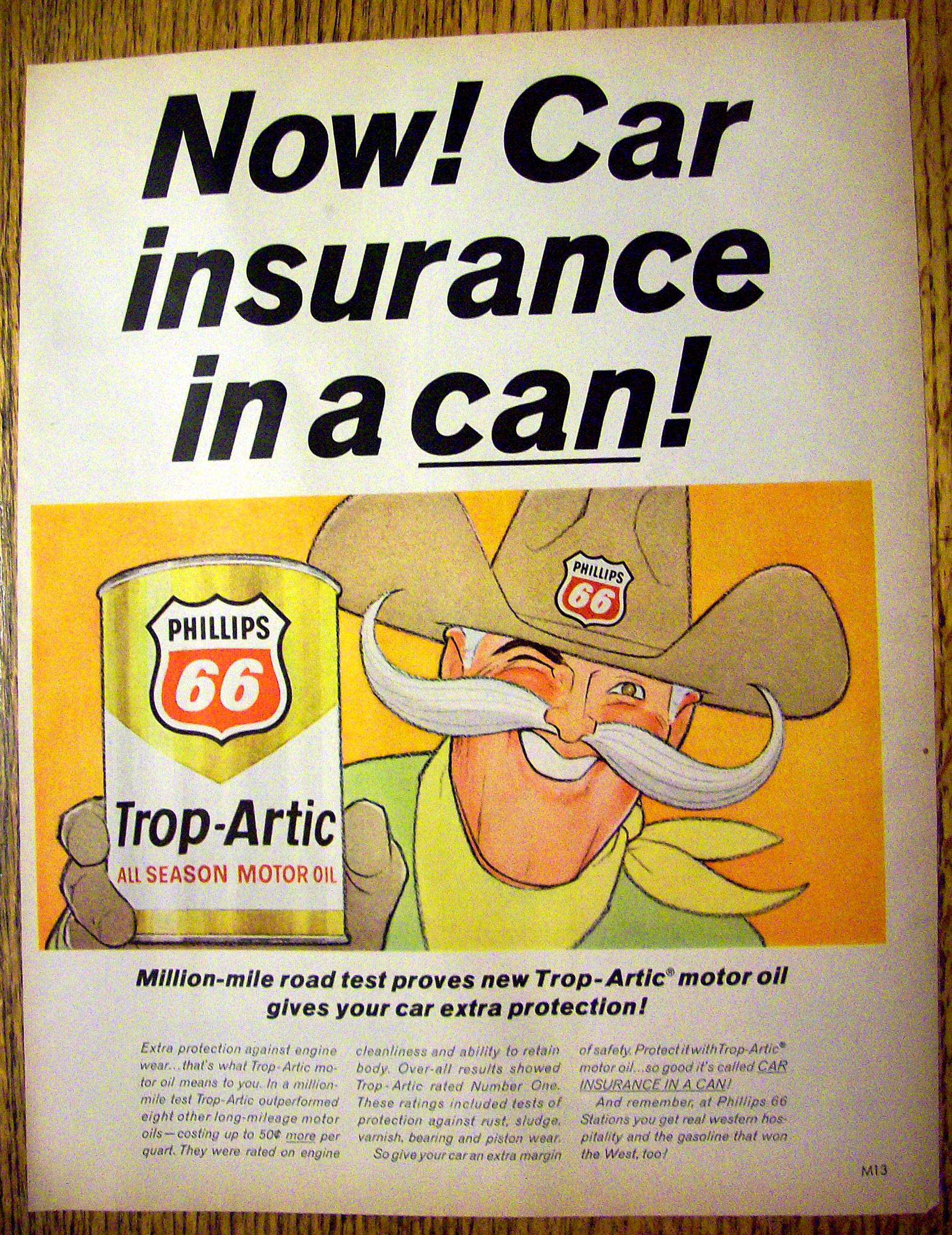 1966 Phillips 66 Trop Artic Motor Oil w/Man Holding Can
