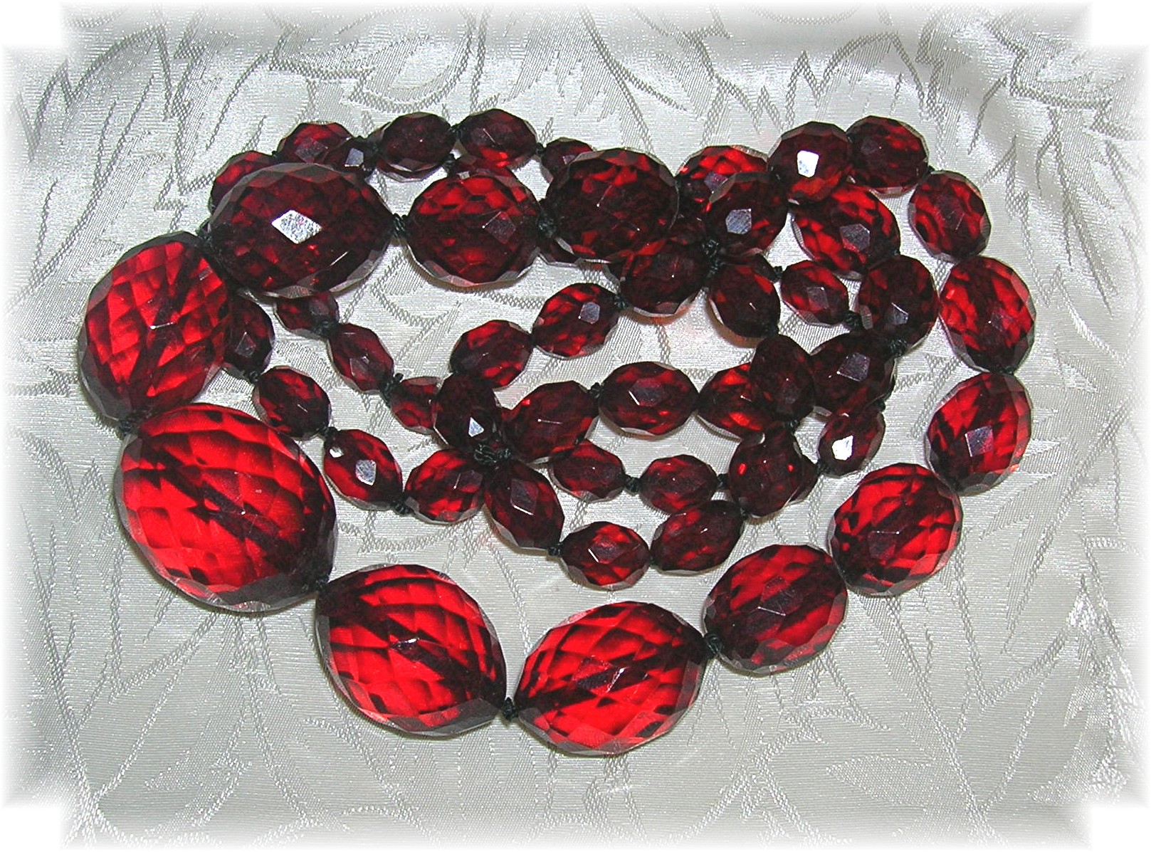 Cherry Amber Faceted  Graduated 30 Inch Necklace