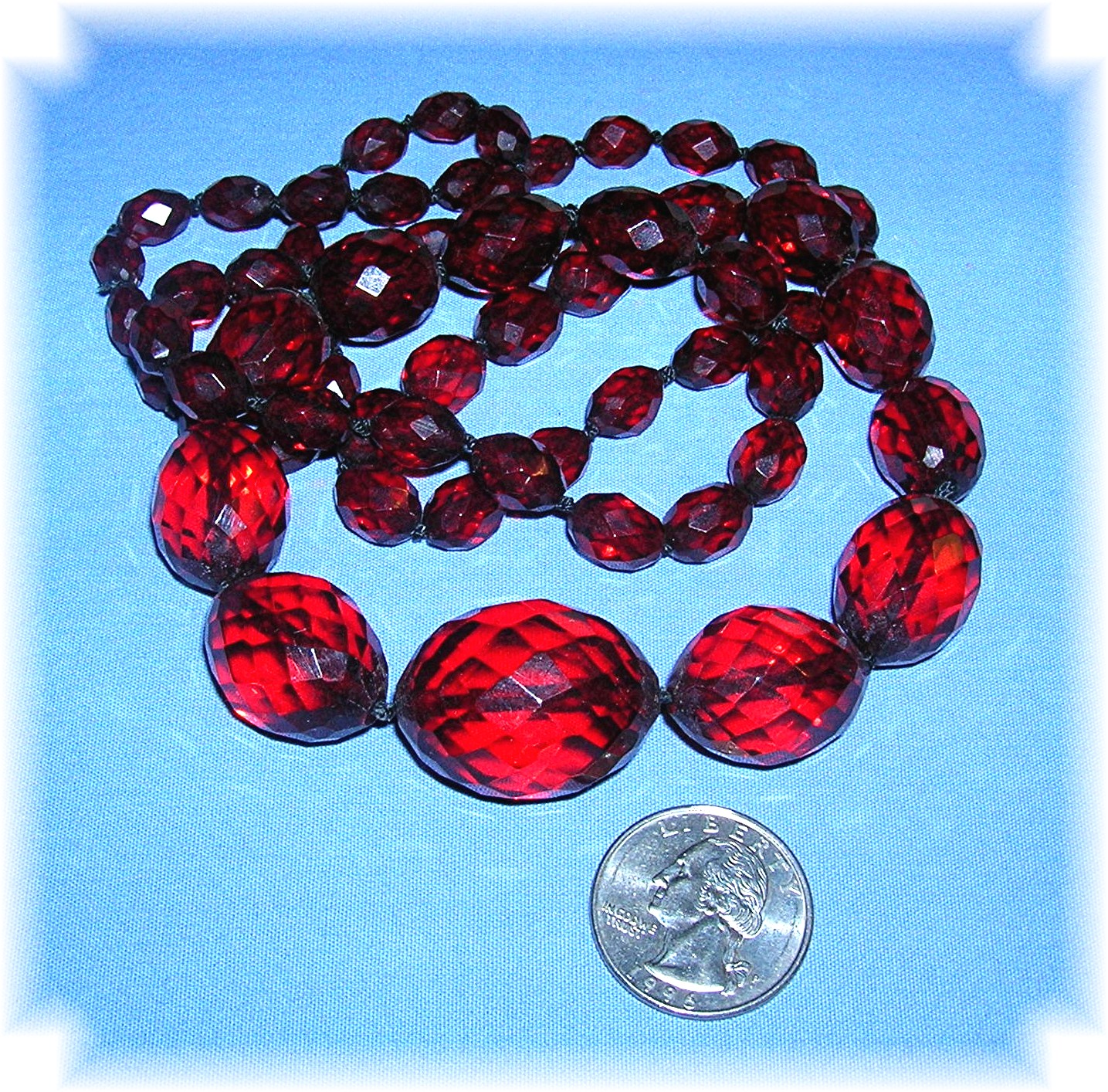 Cherry Amber Faceted Graduated 30 Inch Necklace