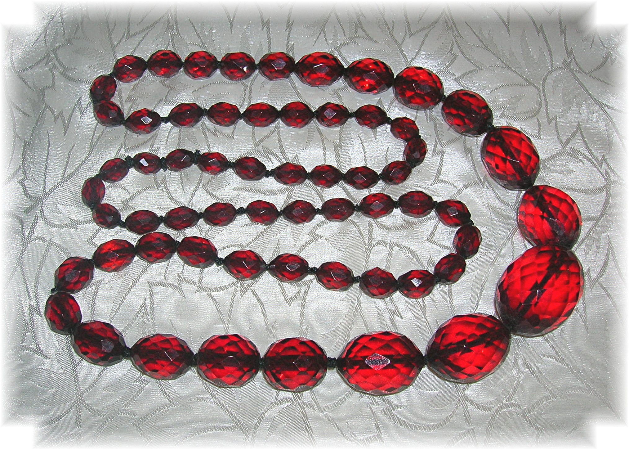 Cherry Amber Faceted  Graduated 30 Inch Necklace