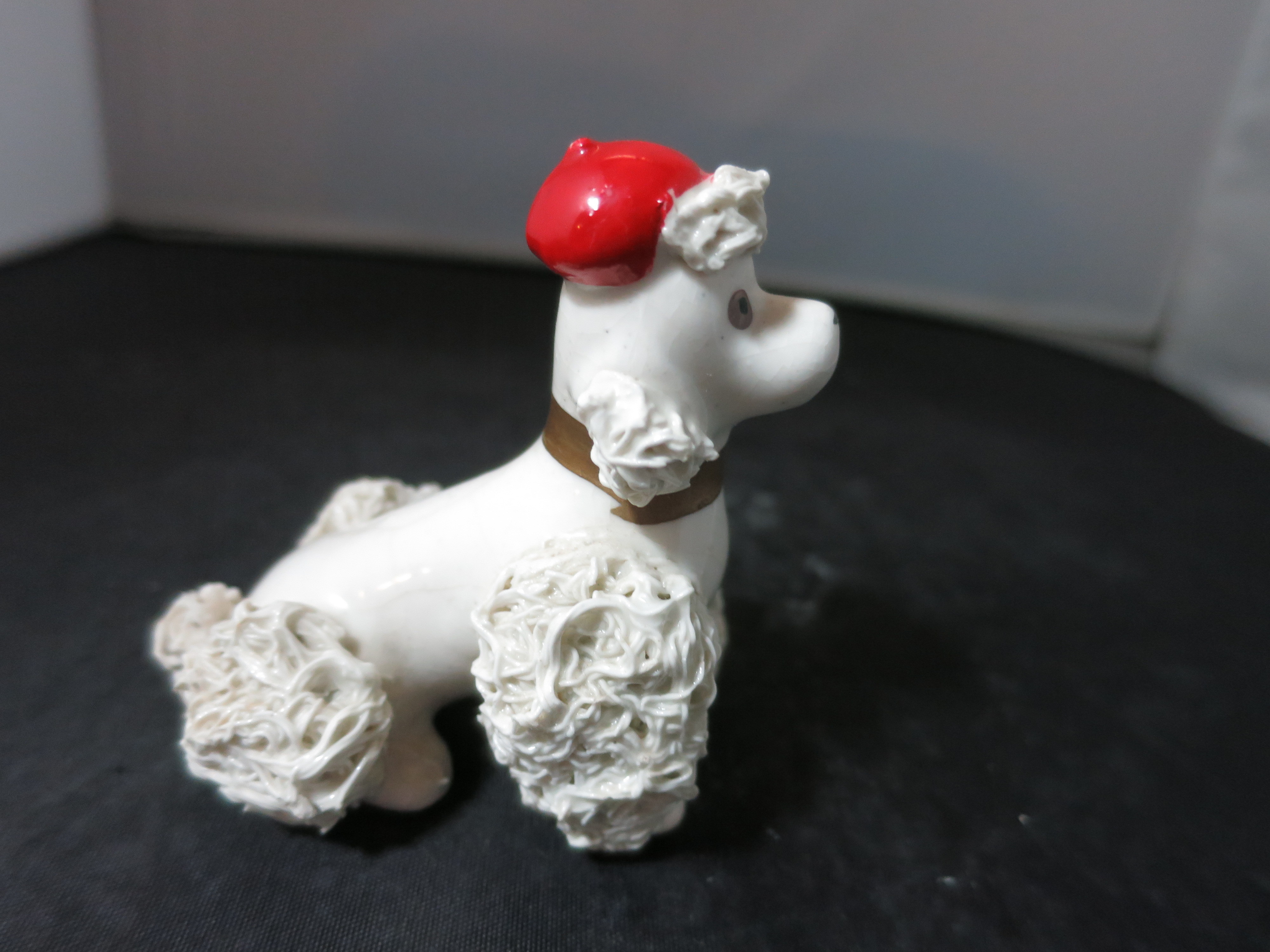 Vintage spaghetti Poodle Figurine Sitting with a Red Hat Japan