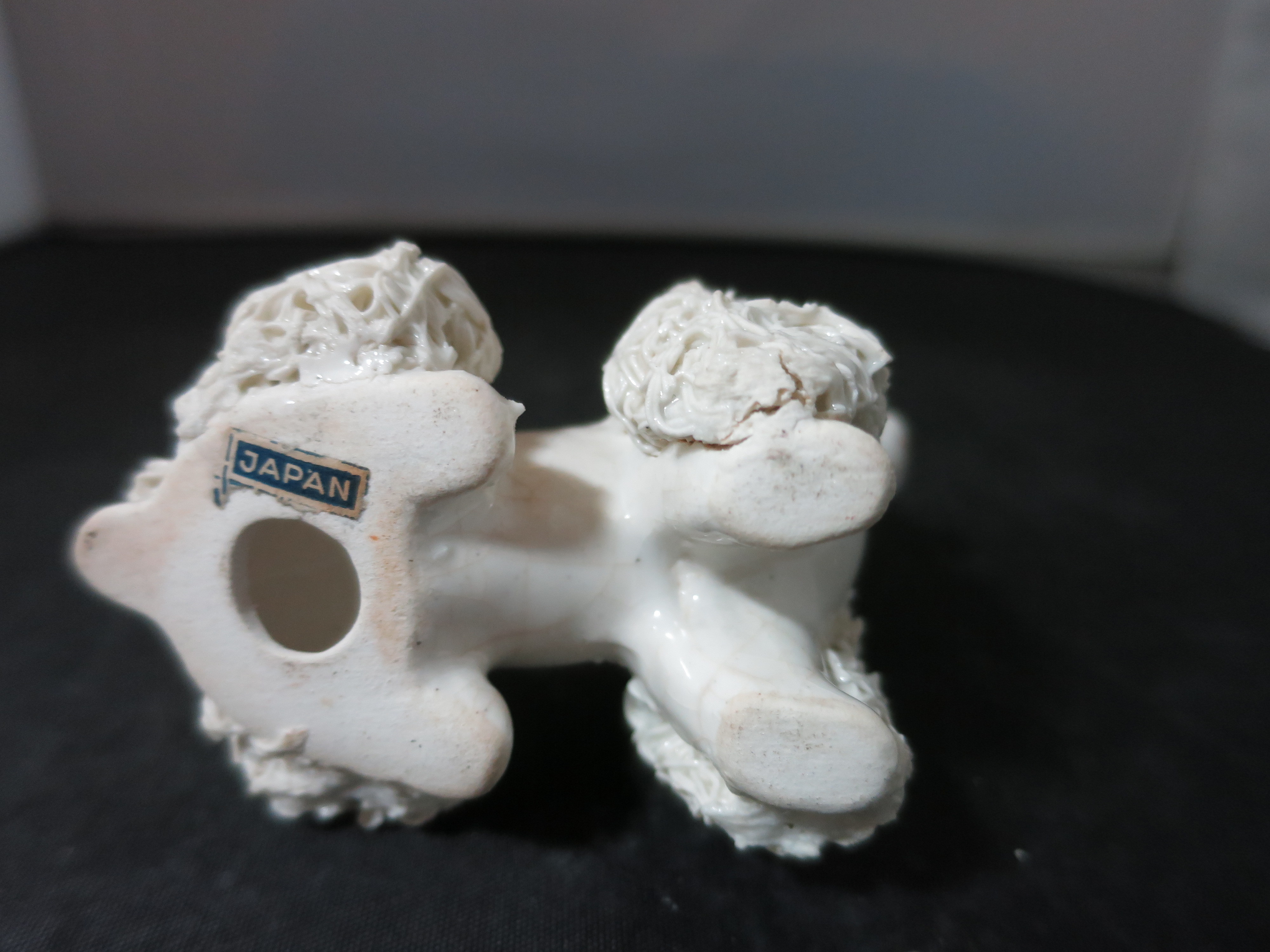 Vintage spaghetti Poodle Figurine Sitting with a Red Hat Japan