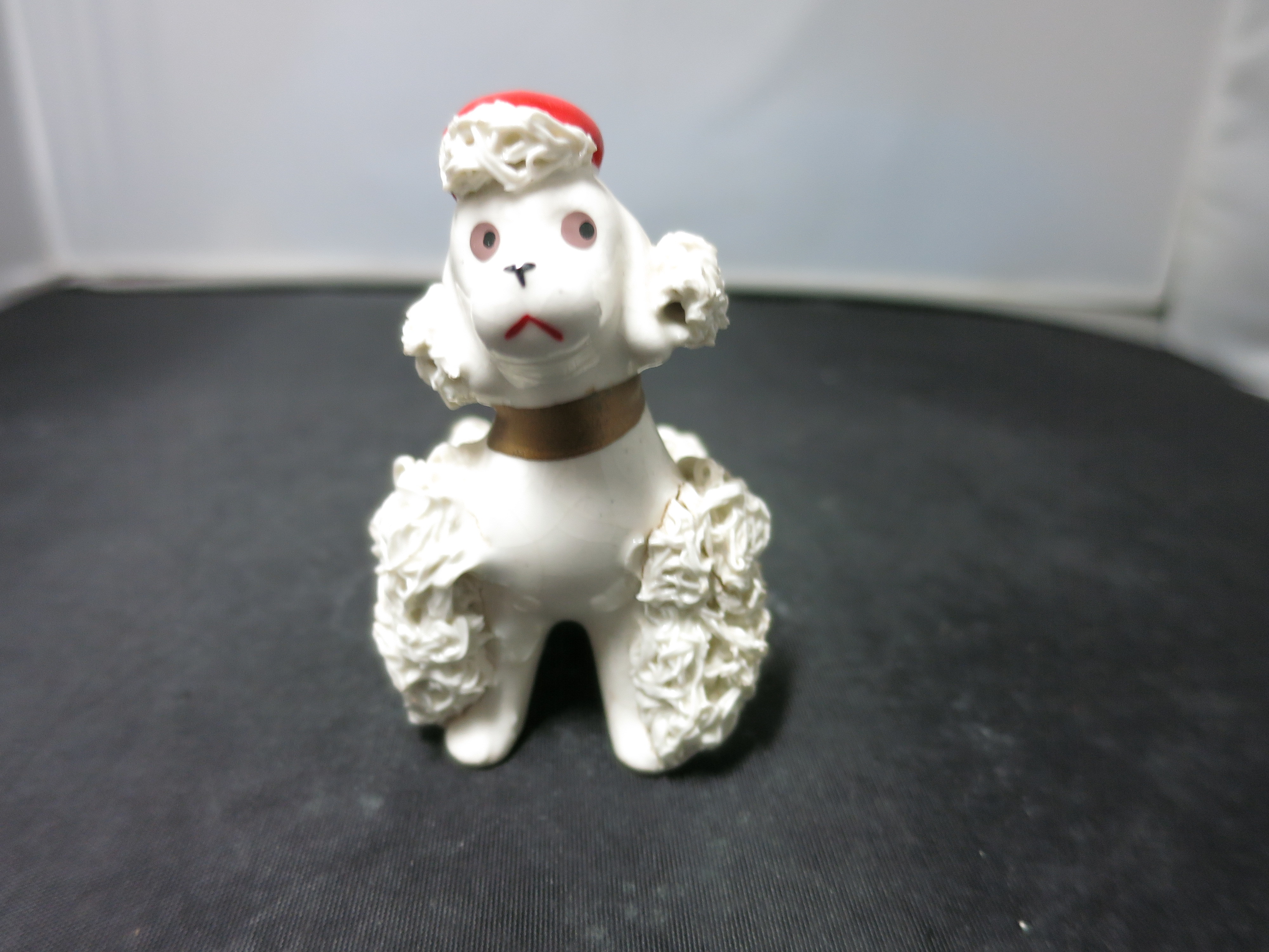Vintage spaghetti Poodle Figurine Sitting with a Red Hat Japan