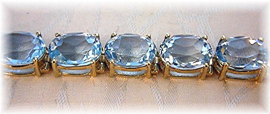 Bracelet 10K Gold Blue Topaz 42ct