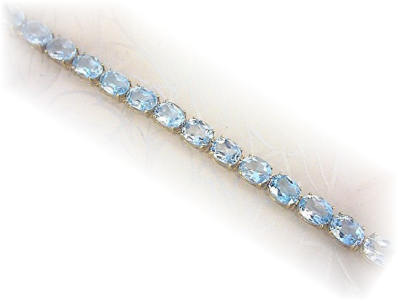 Bracelet 10K Gold Blue Topaz 42ct