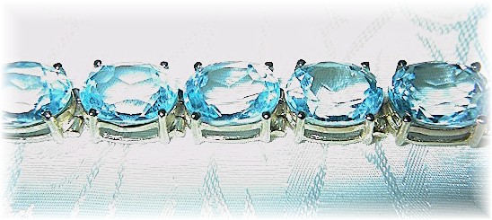 Bracelet 10K Gold Blue Topaz 42ct