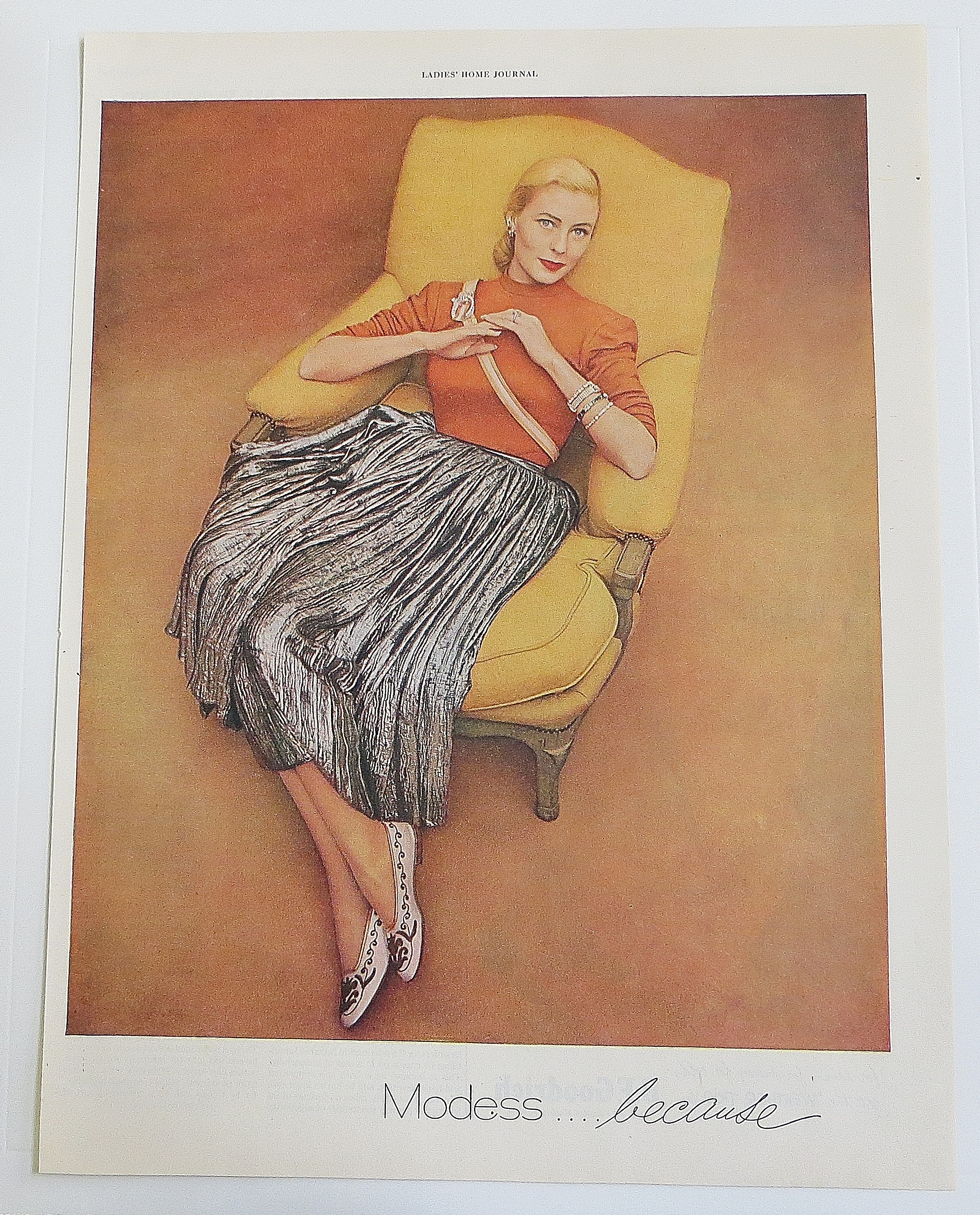 1948 Modess With Woman Sitting In Chair