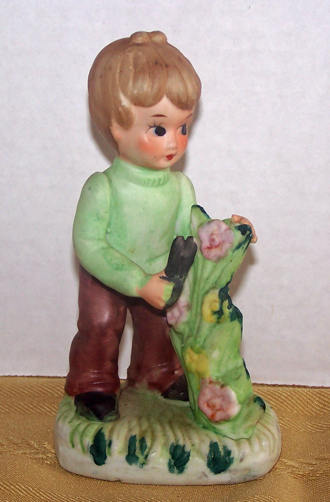 Bisque Boy Tending to a Tall Plant, Made in Korea