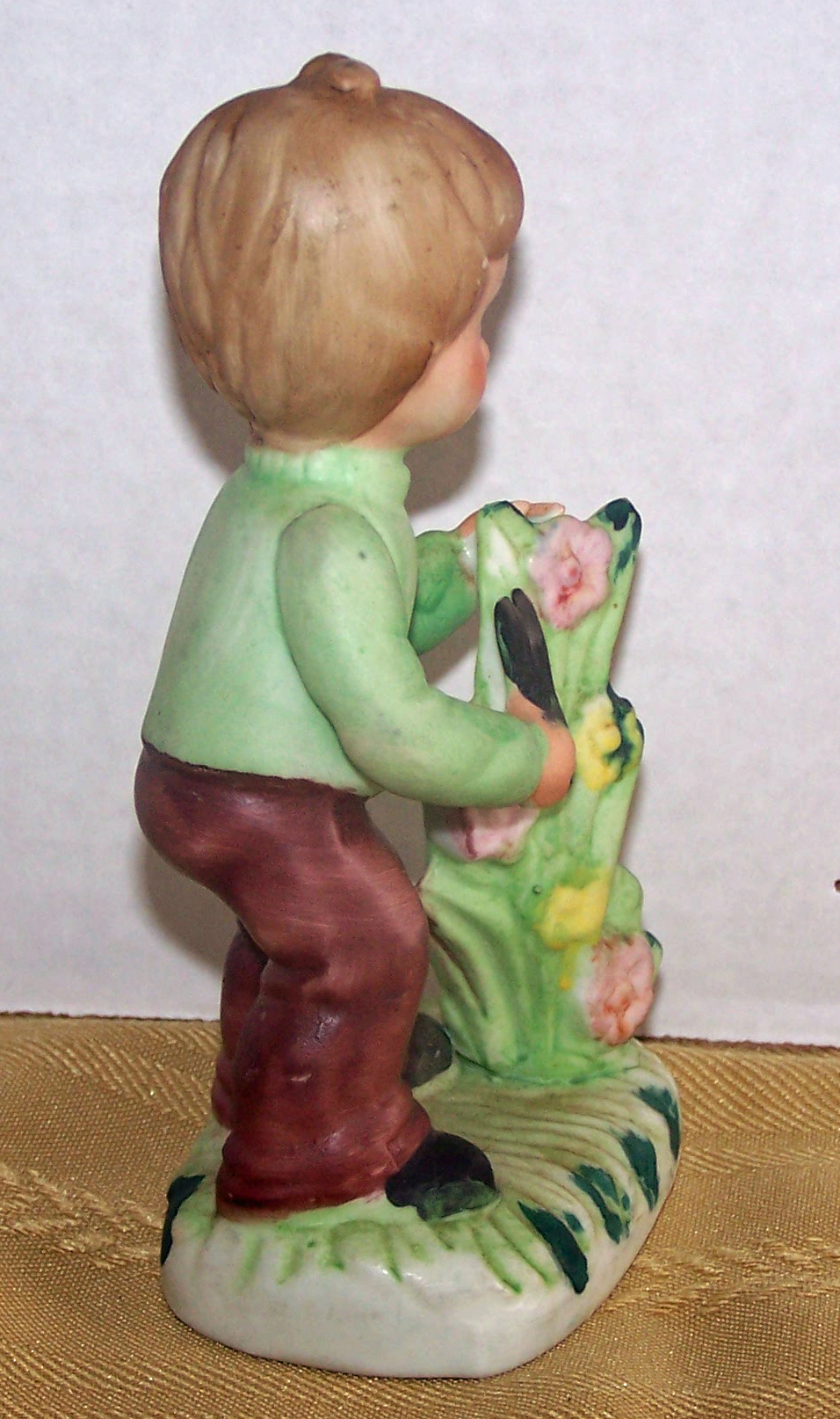 Bisque Boy Tending to a Tall Plant, Made in Korea