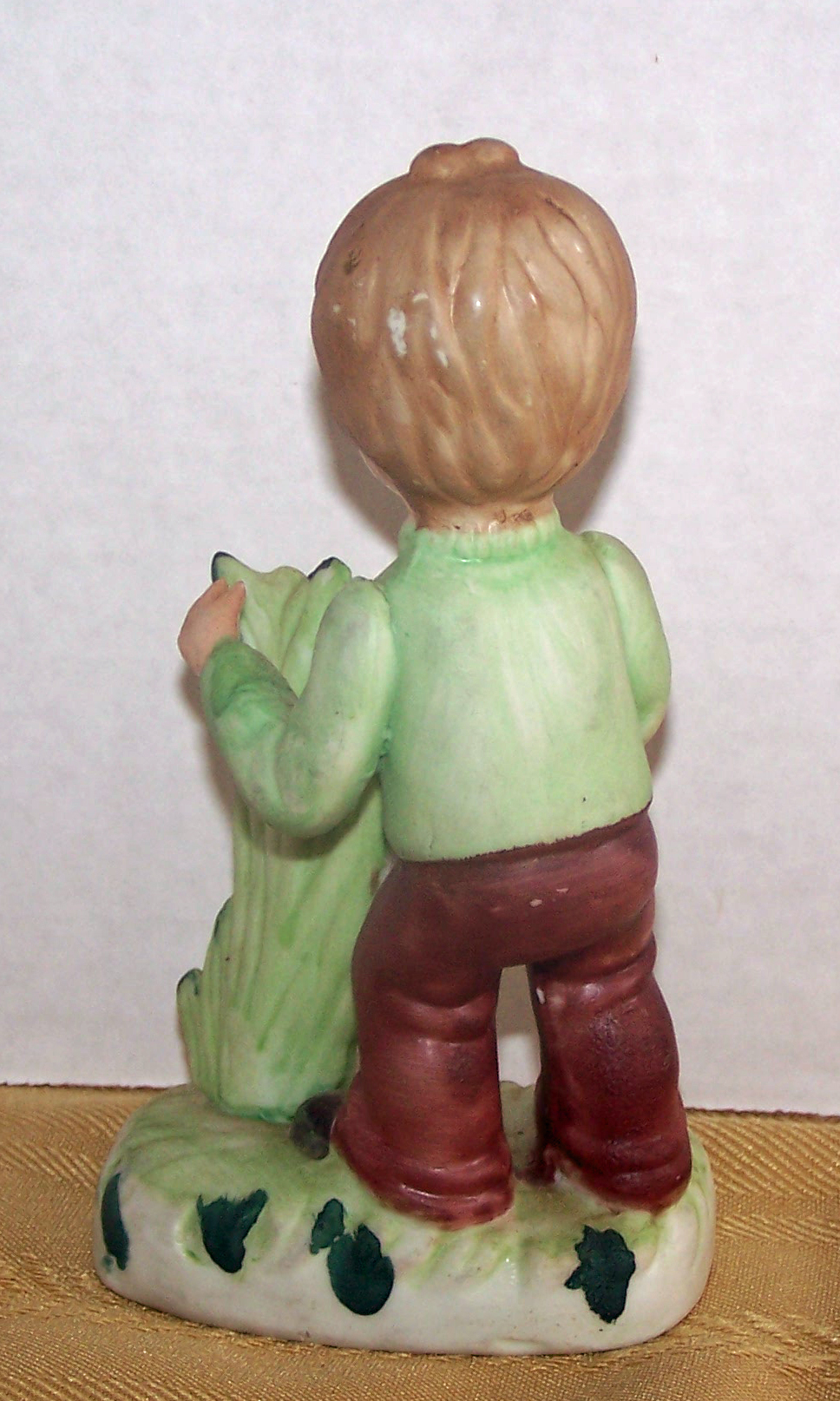 Bisque Boy Tending to a Tall Plant, Made in Korea