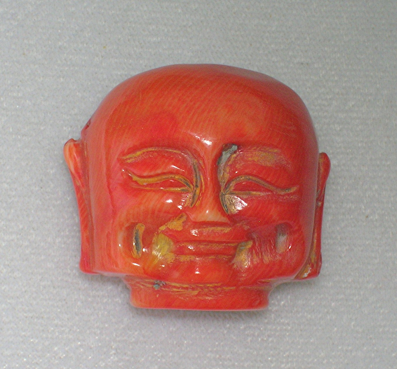 Coral Dyed  Carved  Budha Bead