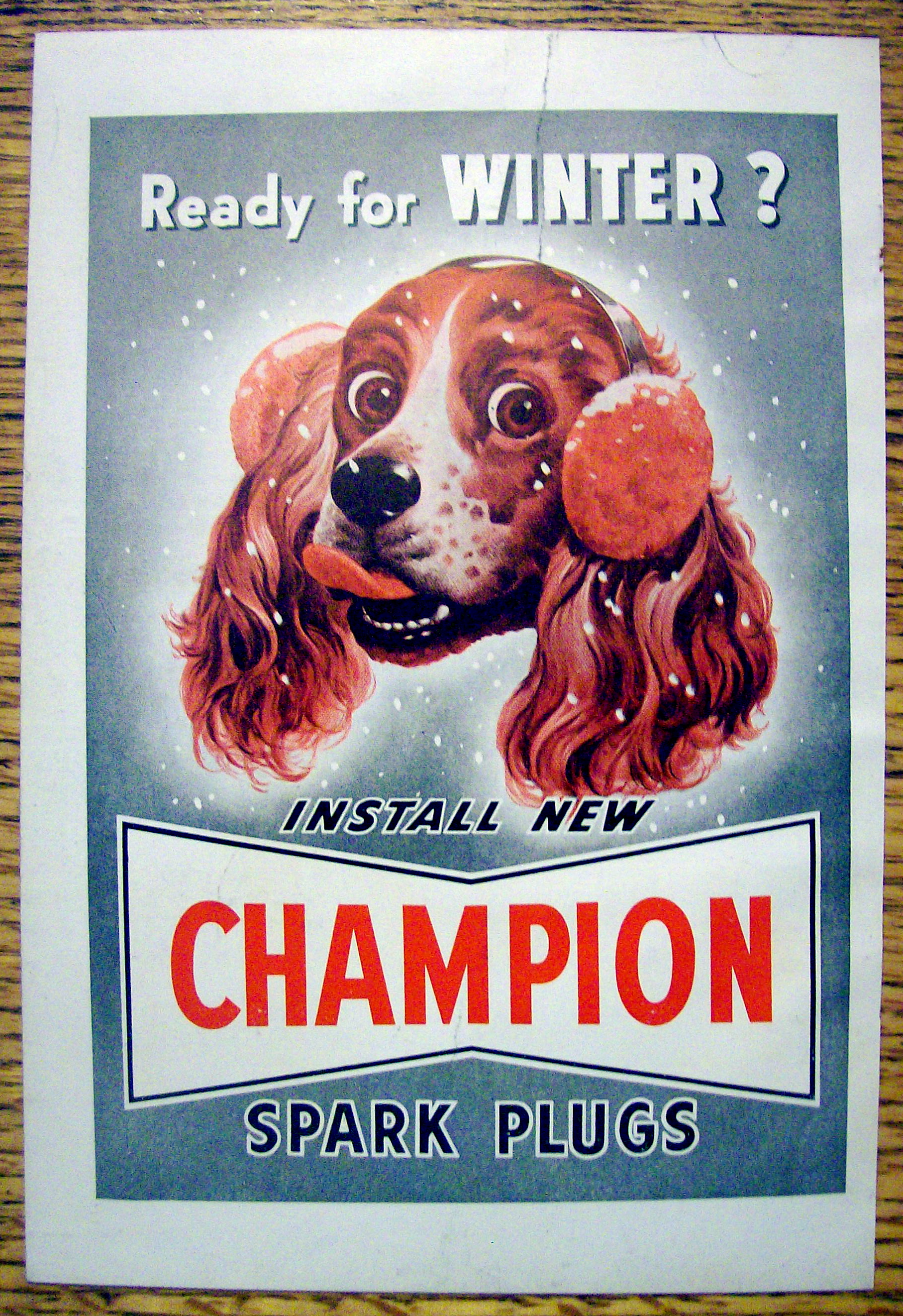 1949 Champion Spark Plugs with Dog Wearing Earmuffs