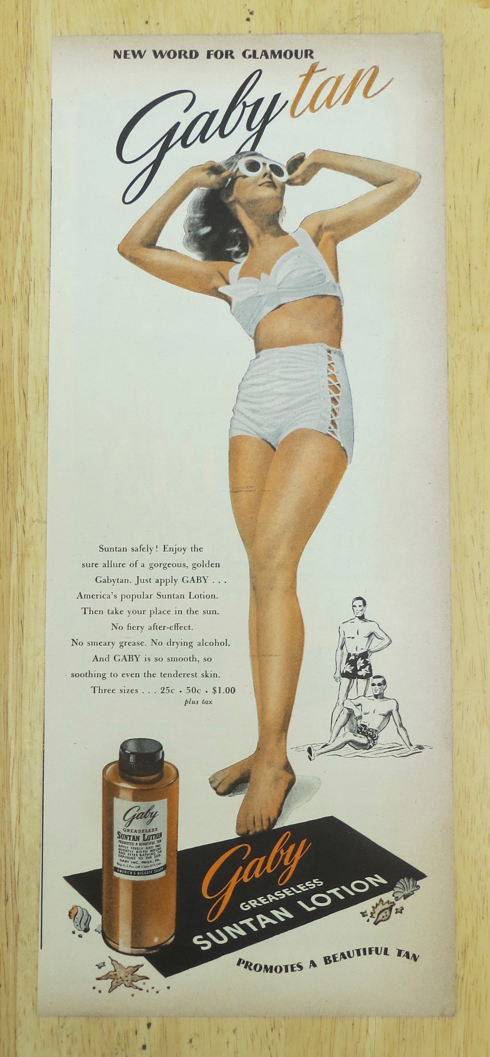1945 Gaby Suntan Lotion with Woman In Bathing Suit