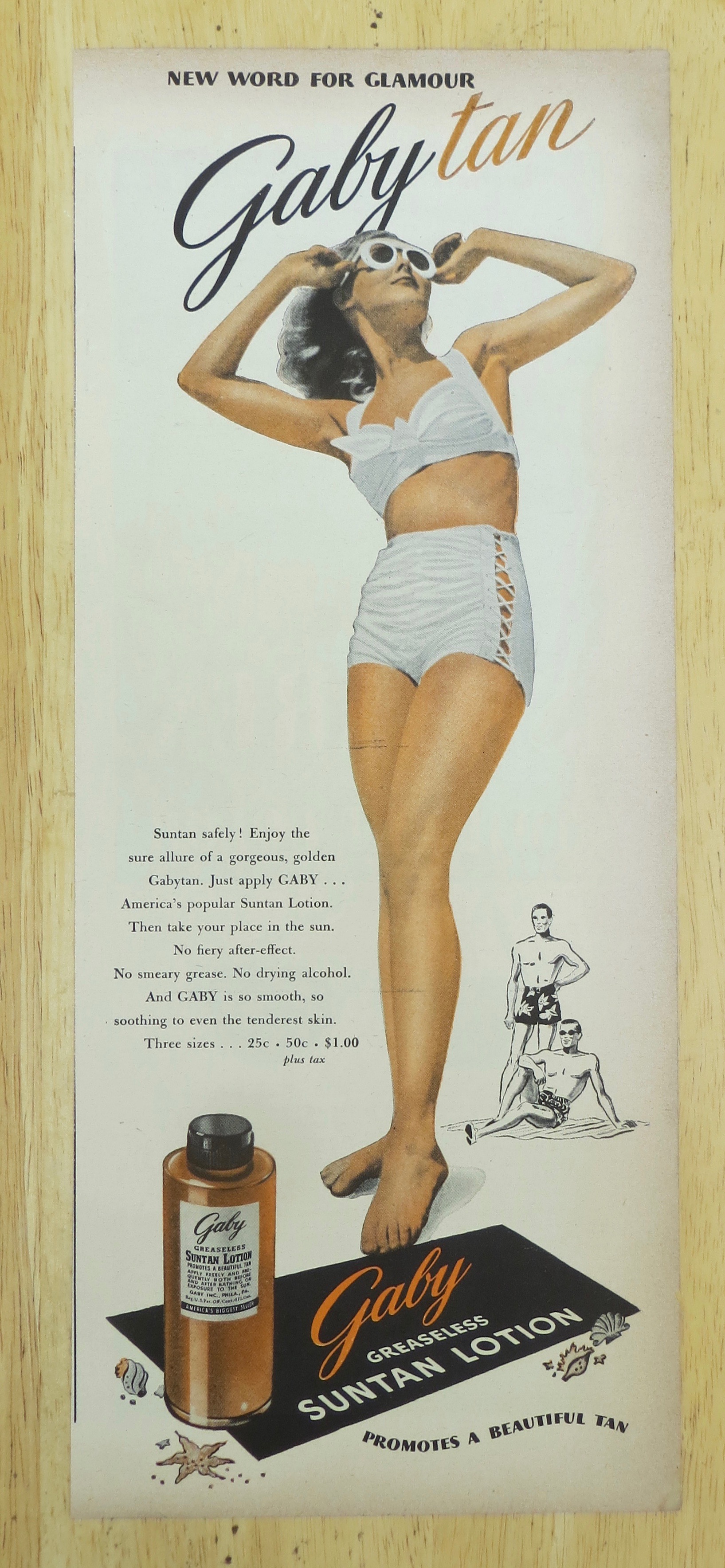 1945 Gaby Suntan Lotion with Woman In Bathing Suit